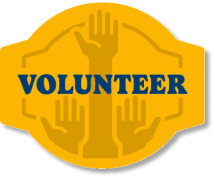 The yellow Volunteer badge