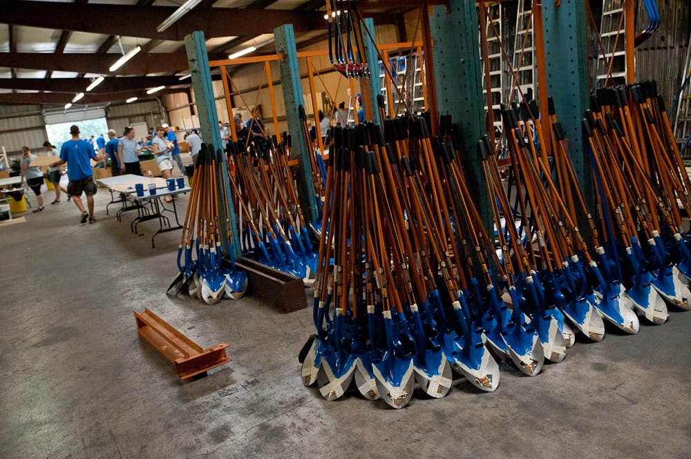 Rows of Houston ToolBank shovels lined up together, ready for use