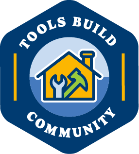 A dark blue icon that says, "Tools Build Community" and features a house with tools inside of it