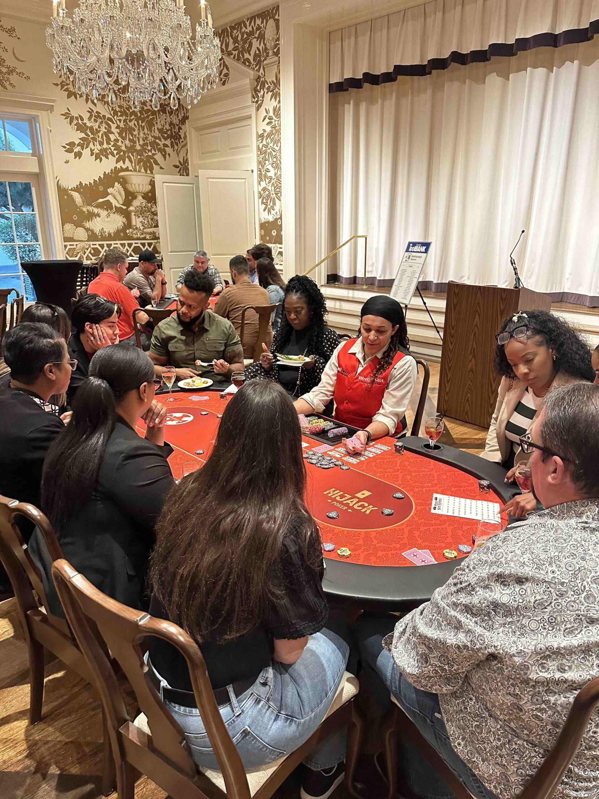 Houston ToolBank volunteers playing poker at a charity event